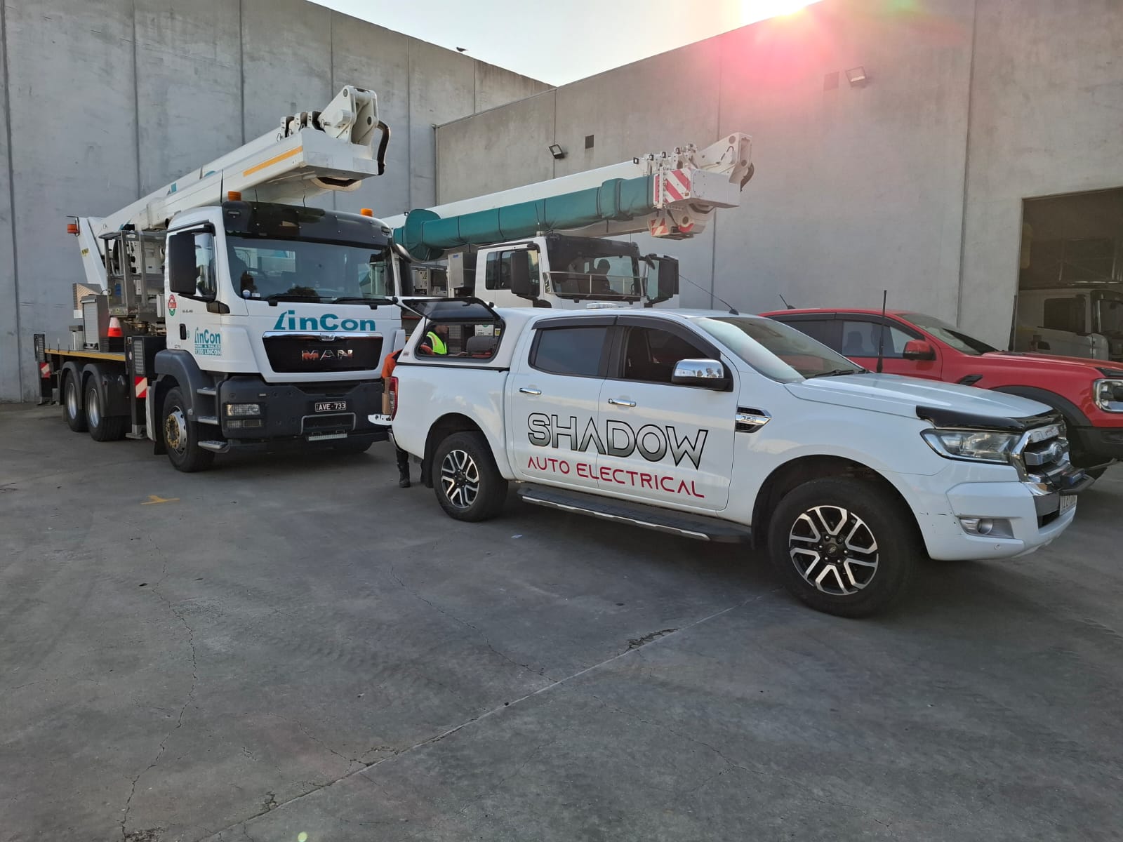 Auto electrician hiding an immobiliser module inside a vehicle